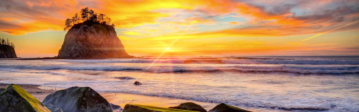 The sun sets on a Washington State beach near La Push.