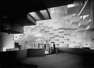 The Bubbleator arrives at the top floor of the Washington State World of Tomorrow Exhibit, Seattle's World's Fair.