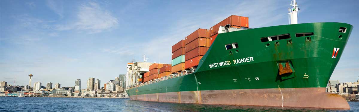 A large container ship at the NW Port Seaport Alliance facility in Seattle arrives to unload containers.